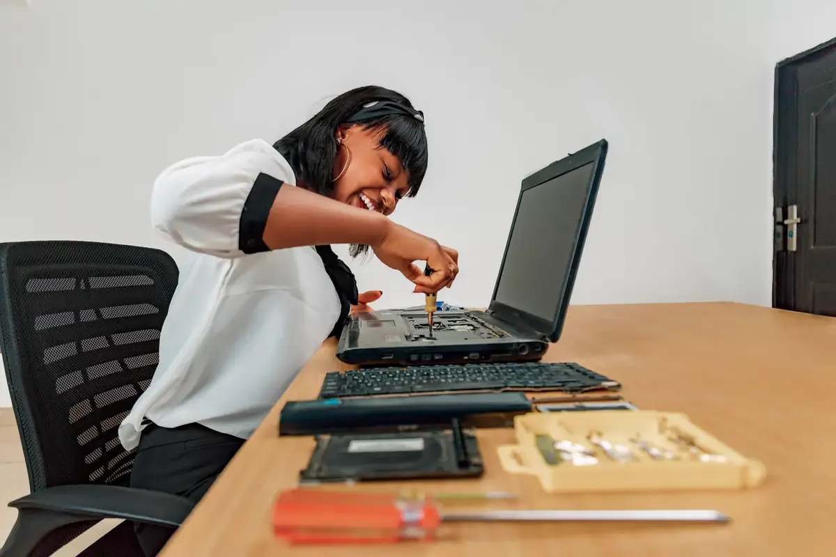 A customer checks enquiries from the Google Business Profile on her laptop